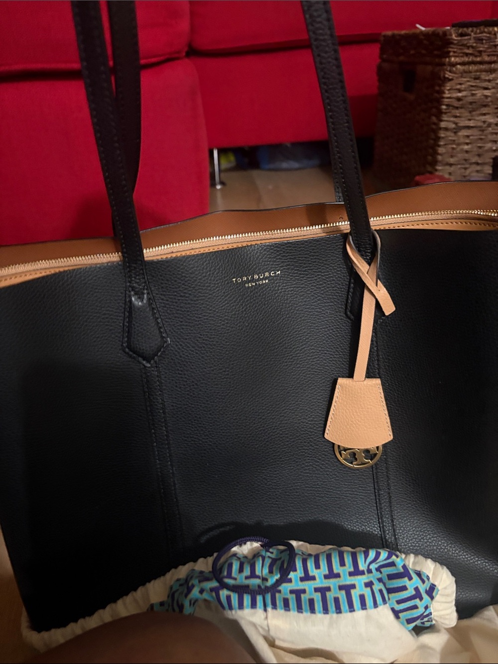 Tory Burch Black and Tan Leather Tote with Logo Charm with dust bag